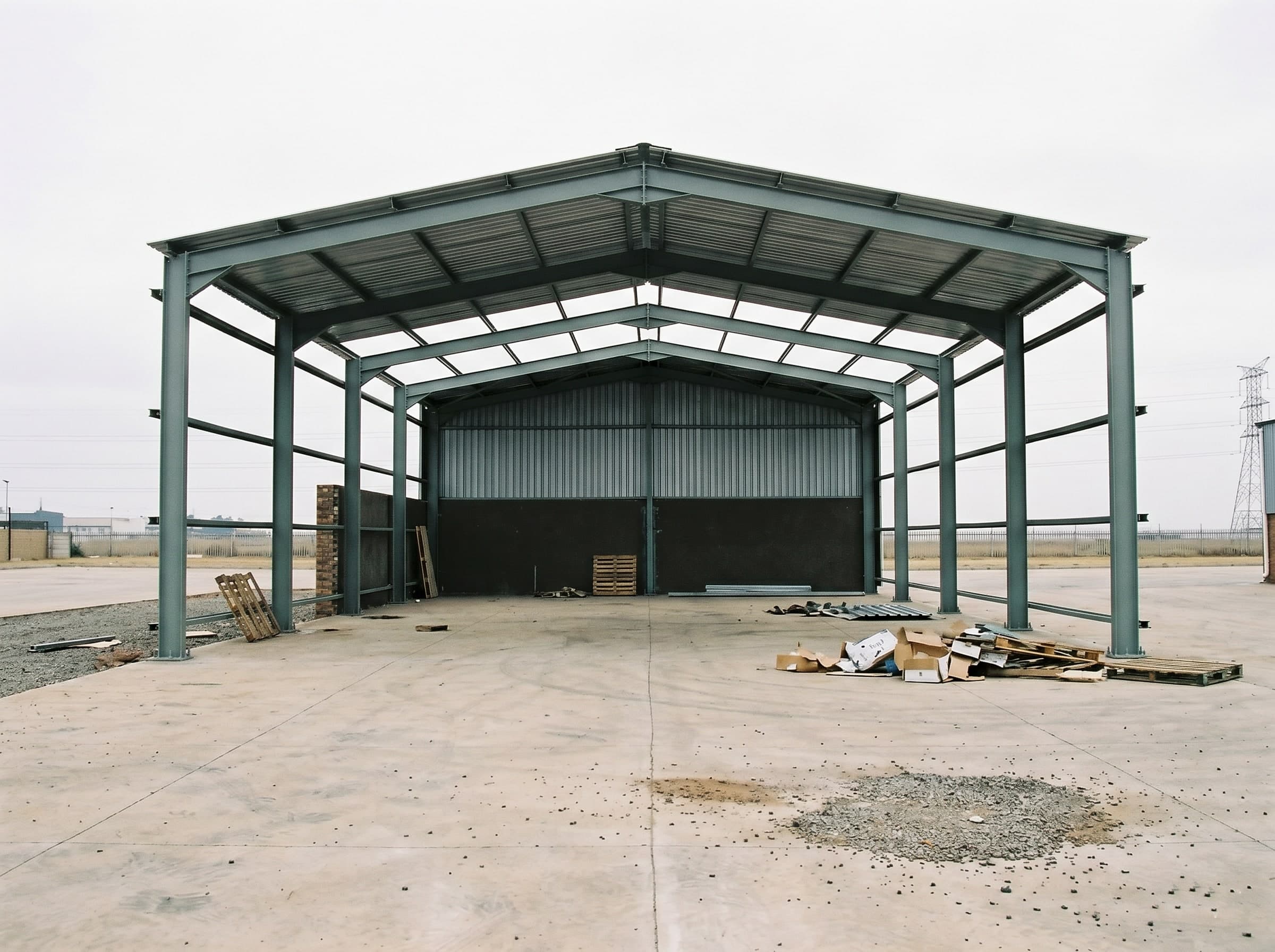 Close-up of epoxy coating film build on structural I-beam steel in Gauteng