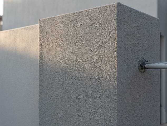 Completed stucco or specialized wall finish on an estate elevation