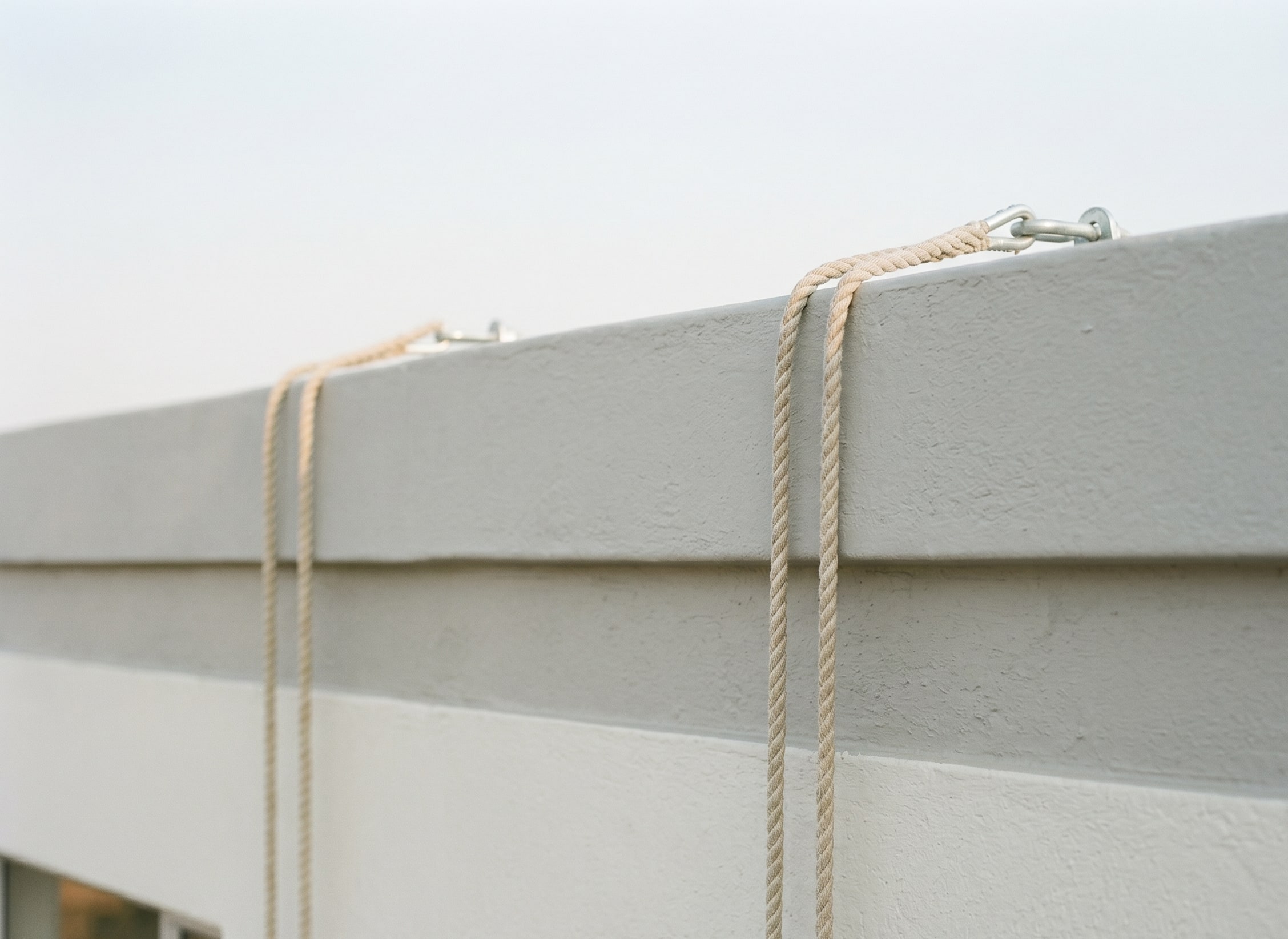 Completed balcony and façade coating after rope access on a Gauteng apartment block