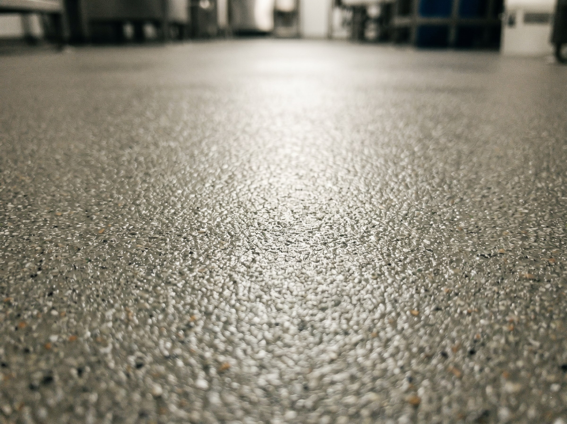 Close-up of a stainless drain surround on a completed hygienic floor in Gauteng