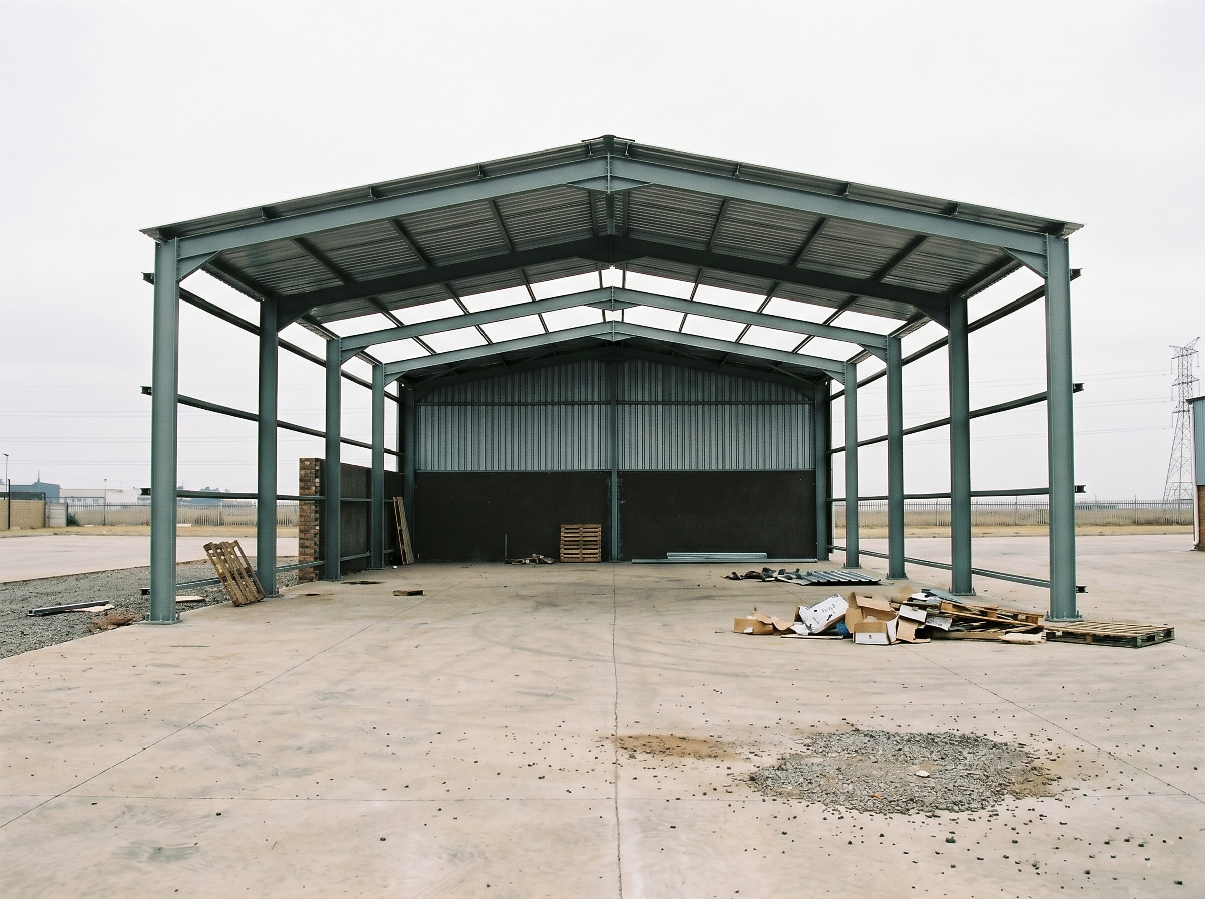 Close-up of epoxy coating film build on structural I-beam steel in Gauteng