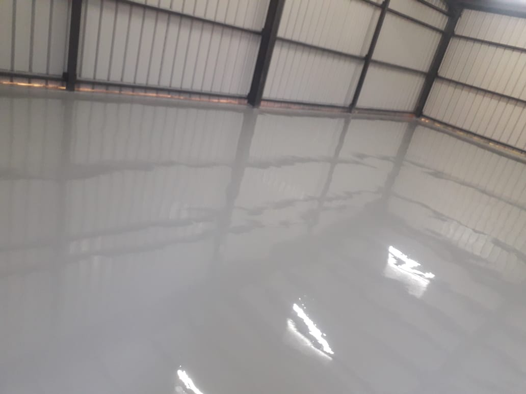 Expansion joint sealing on a logistics warehouse floor slab