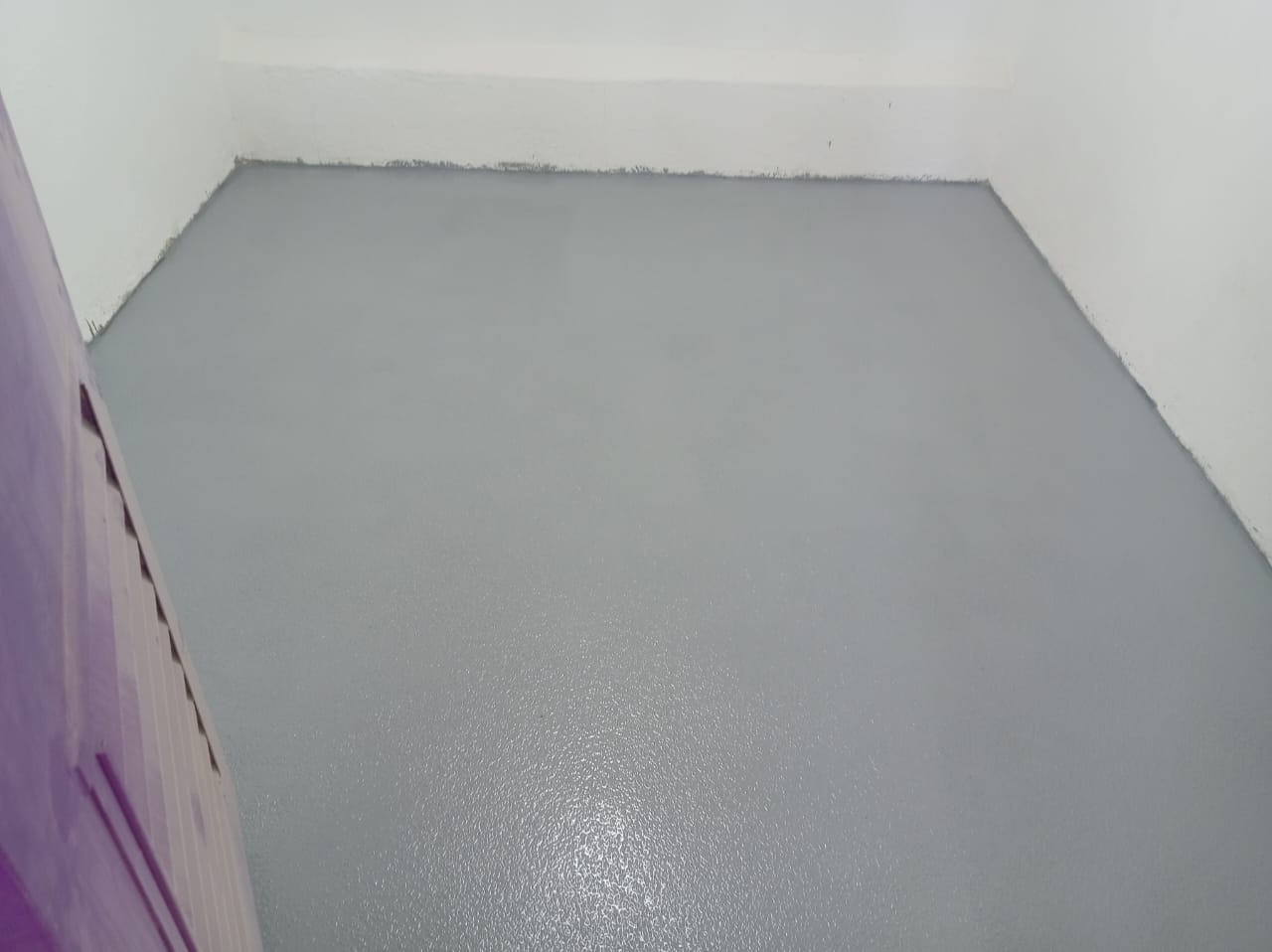 Chemical rising damp injection and salt-retardant replastering on a townhouse