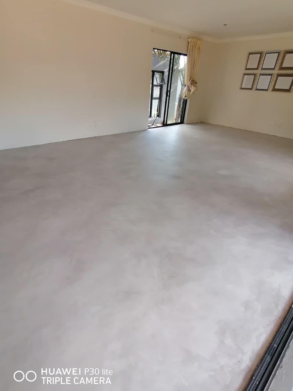 Parking garage structural mortar repair before protective topcoat