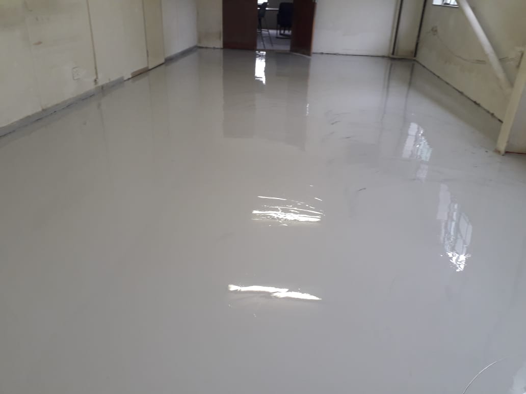 Chemical rising damp injection and salt-retardant replastering on a townhouse