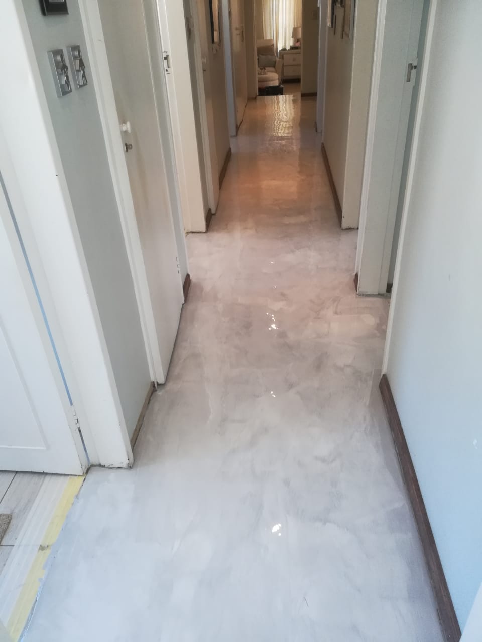 Chemical rising damp injection and salt-retardant replastering on a townhouse