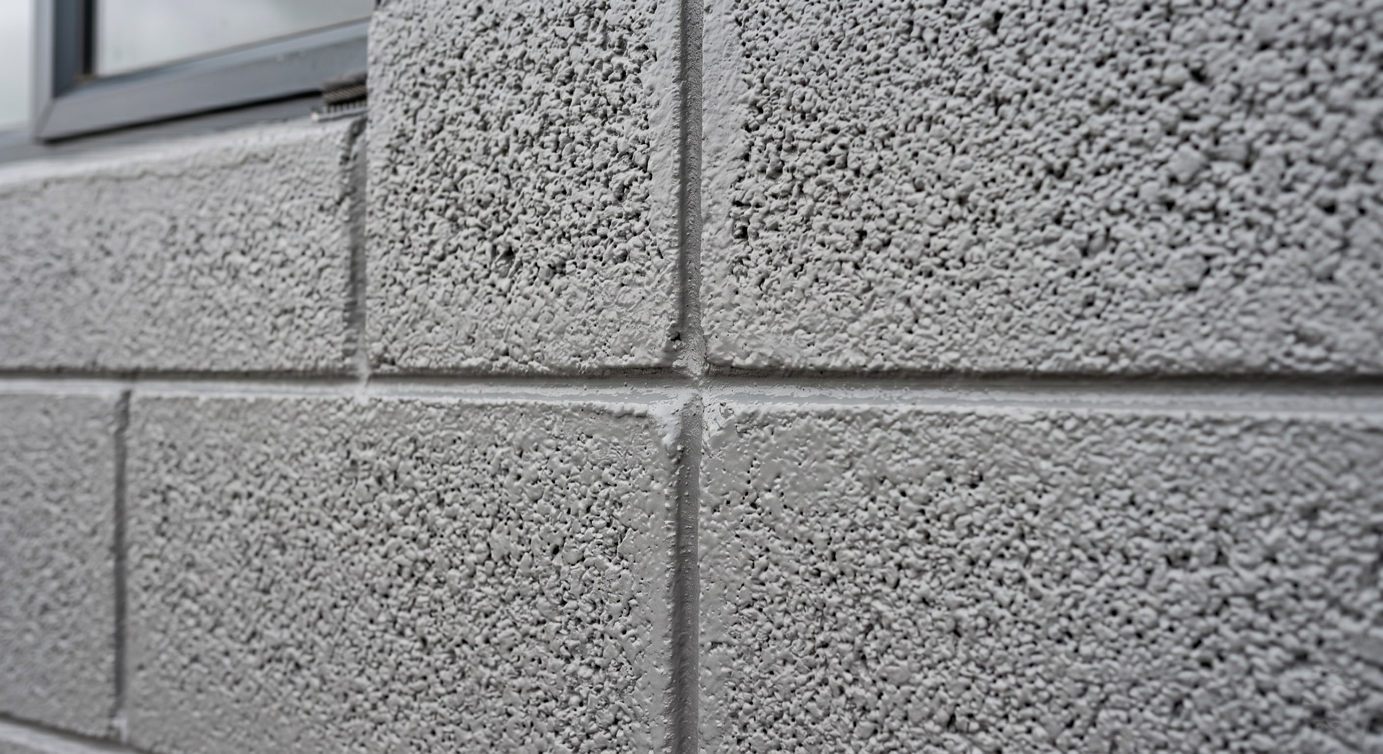 Completed interior wall coatings at an empty Gauteng warehouse loading bay