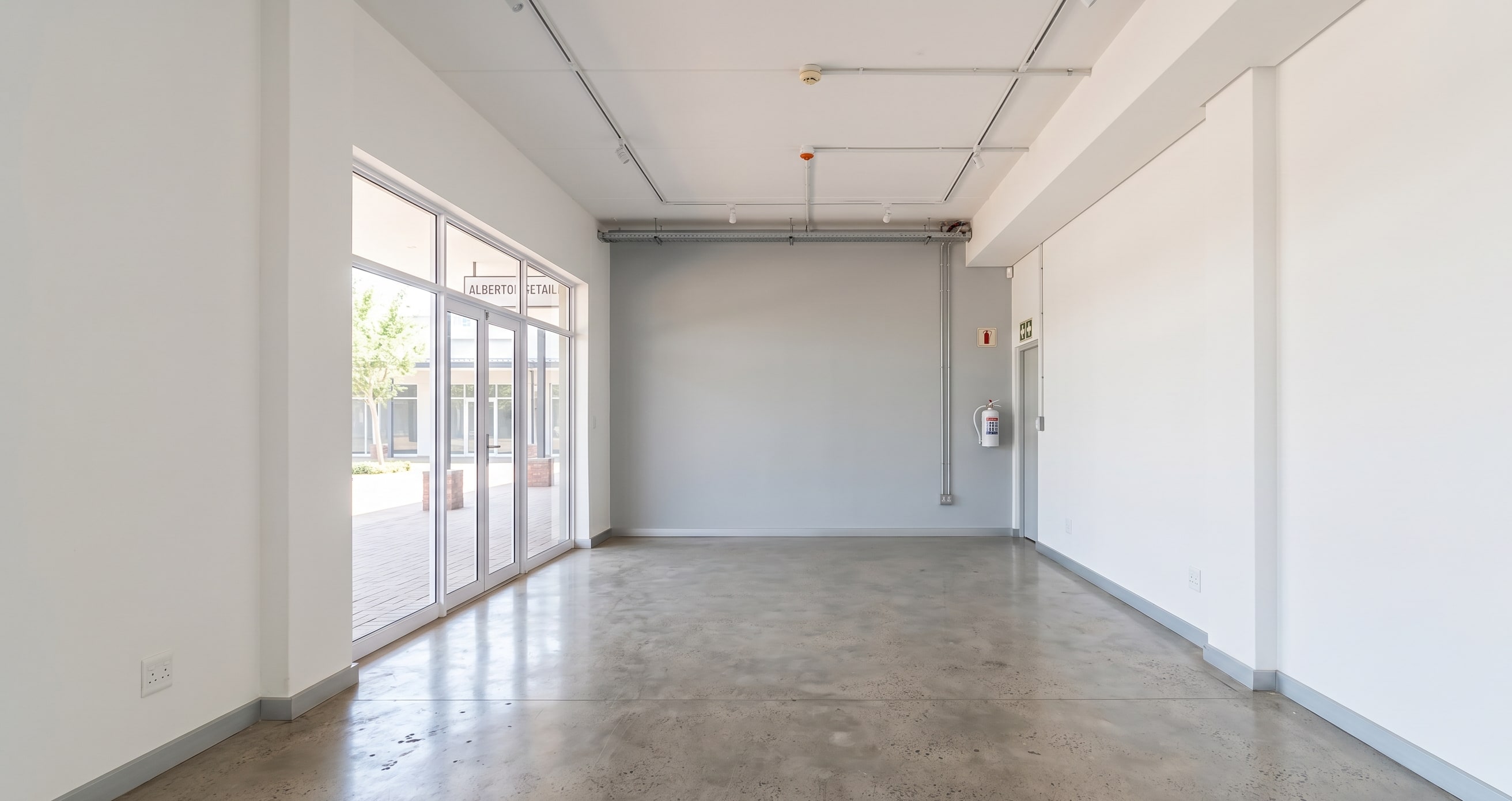 Completed internal wall repaint in a vacant Gauteng office meeting room