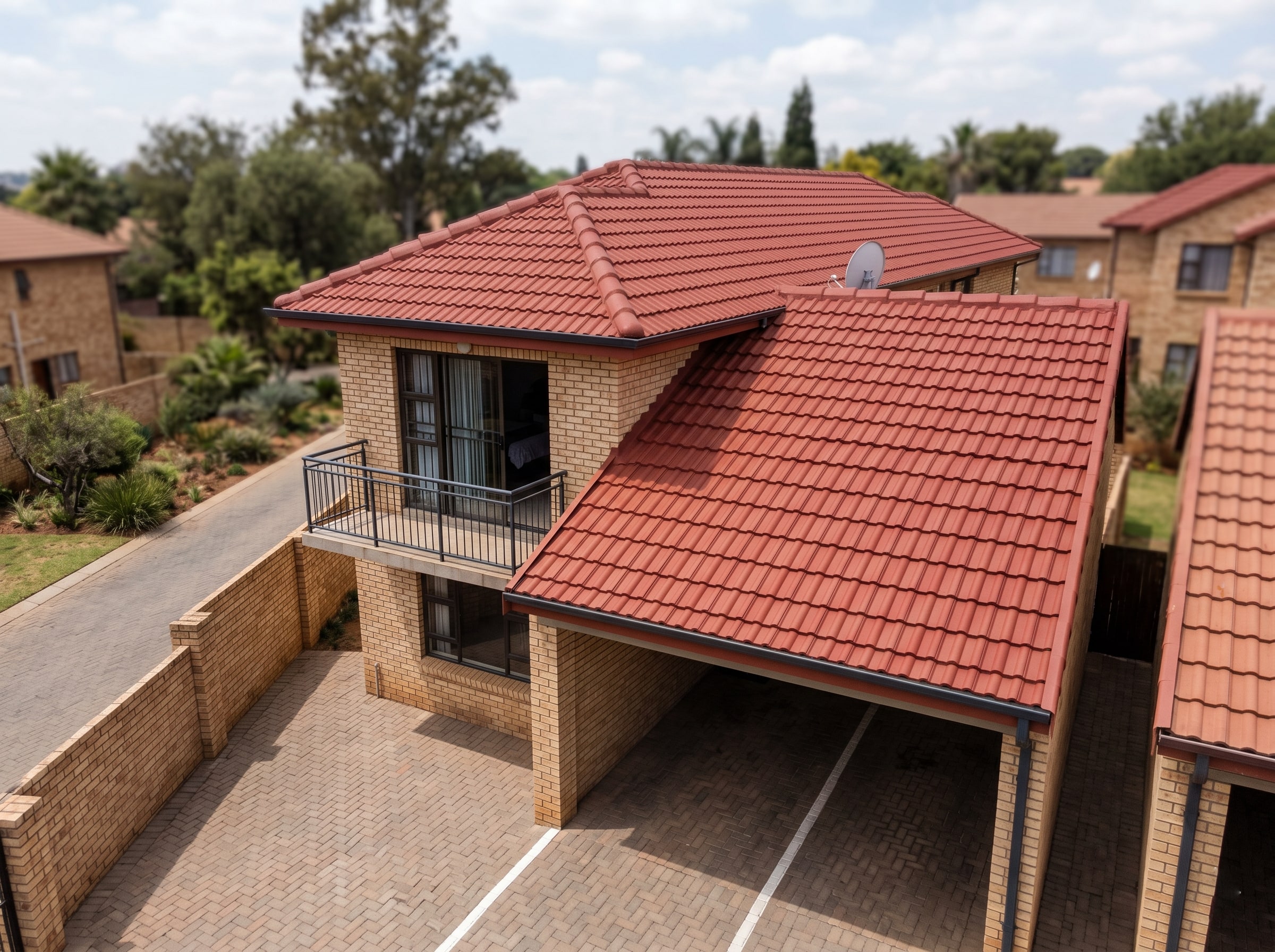 Close-up of completed UV-stable acrylic coating on concrete roof tiles in Gauteng